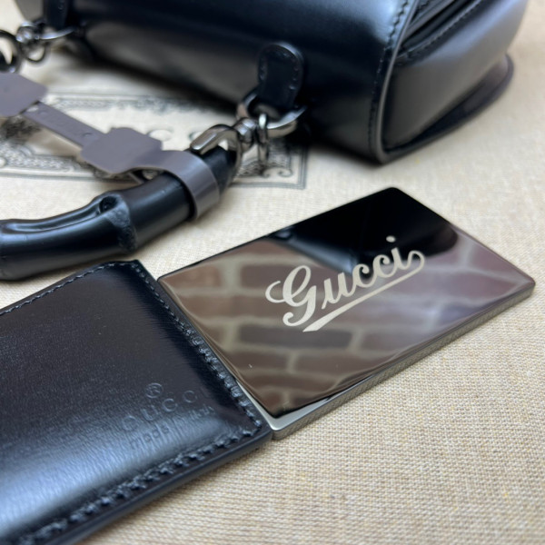 G*u*i small top handle bag with bamboo