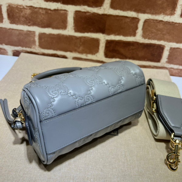 G*u*i gg matelassé leather top handle bag