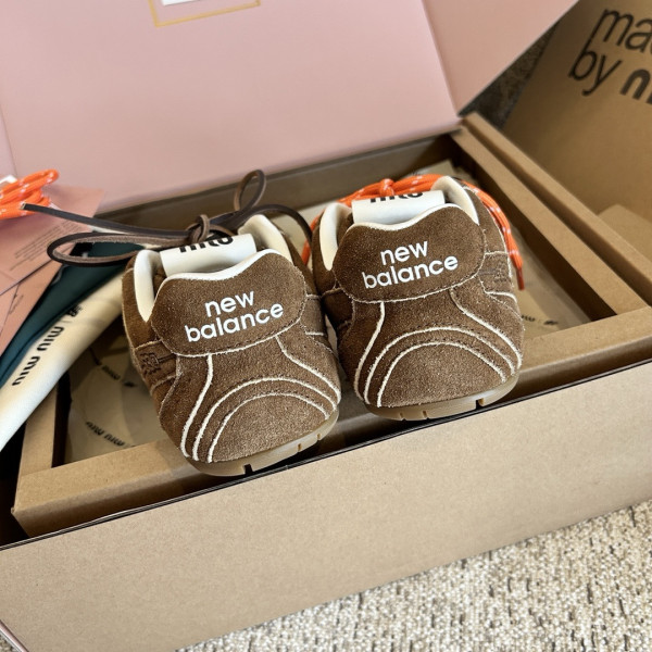 M*um*u x new balance sneaker