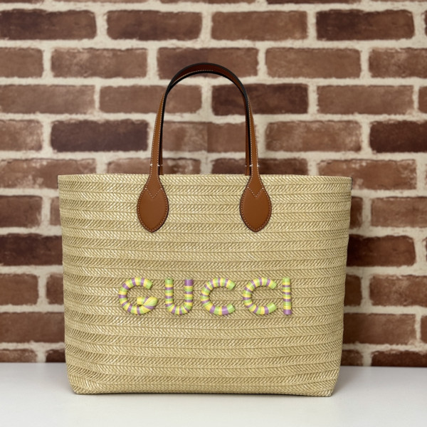 G*u*i medium straw-effect tote