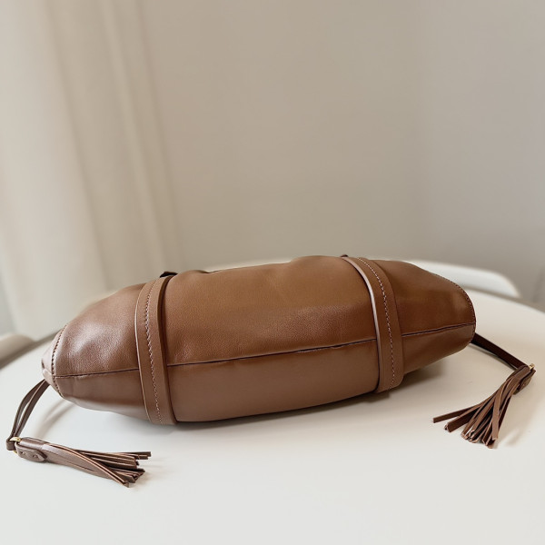 M*um*u joie nappa leather bag