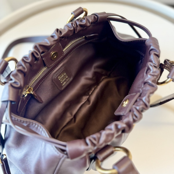 M*um*u joie nappa leather bag