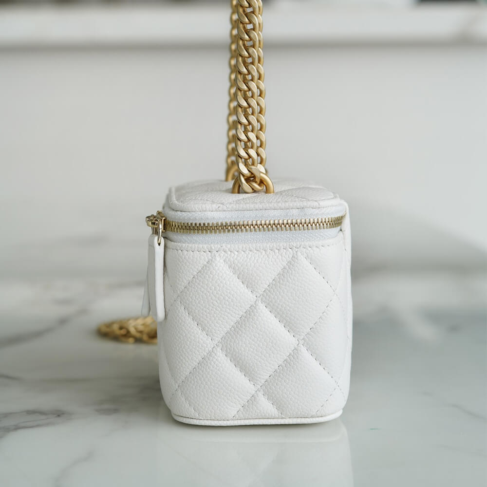 Ch*el small gold ball makeup bag