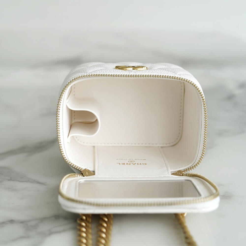 Ch*el small gold ball makeup bag