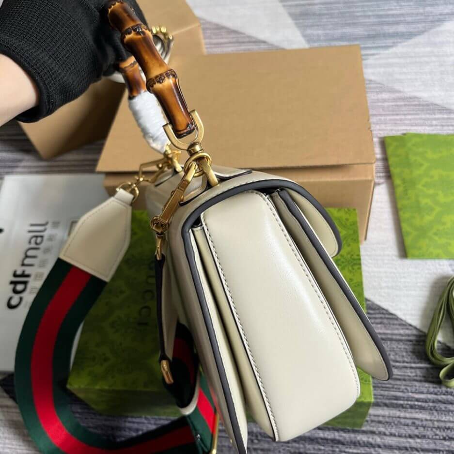 G*u*i bamboo 1947 medium top handle bag