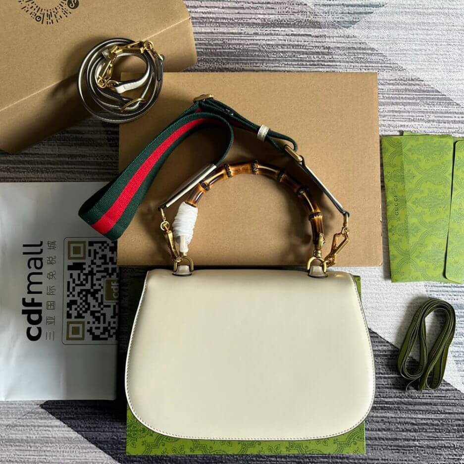 G*u*i bamboo 1947 medium top handle bag