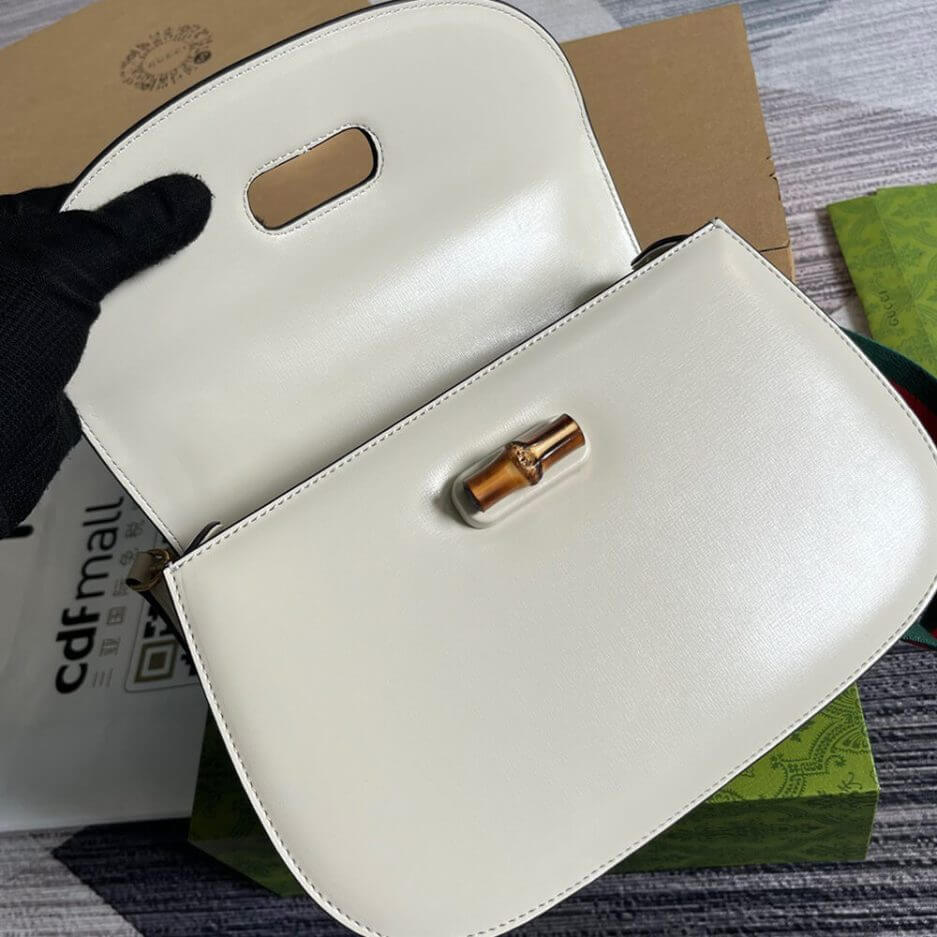 G*u*i bamboo 1947 medium top handle bag